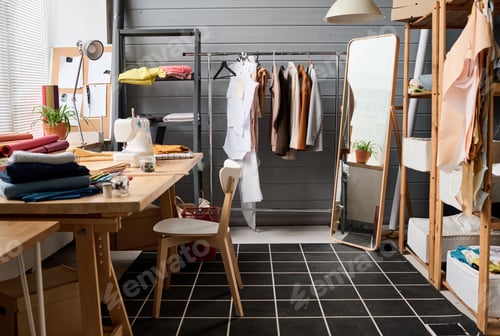Preview: Interior of spacious workshop of modern fashion designer with workplace
