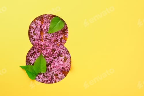 Preview: 8 March greeting card. Paper cut Eight made of yellow background and fresh spring flowers bouquet of