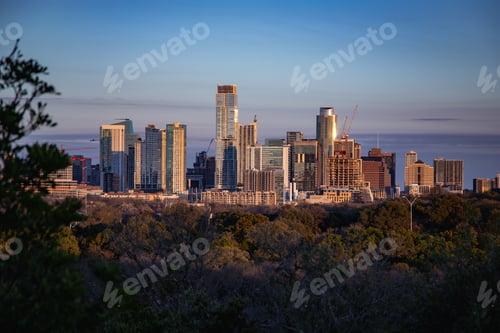 Preview: Aerial view of the beautiful skyline of Downtown Austin, Texas illuminated by the golden sunset