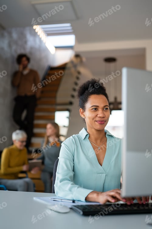 Preview: Black woman working in office and futuristic graphical user interface concept. System engineering.