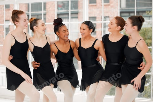 Preview: No one gets left behind. Shot of a group of ballet dancers laughing together.