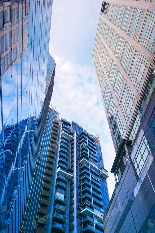 Preview: low angle view of singapore city buildings.