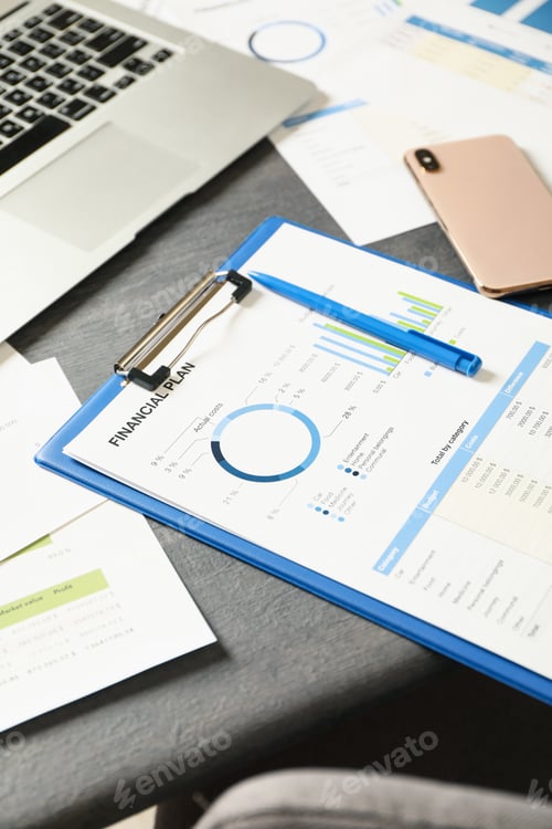 Preview: Concept of financial planning on gray wooden table