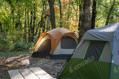 Preview: Tents on campsite in early morning light