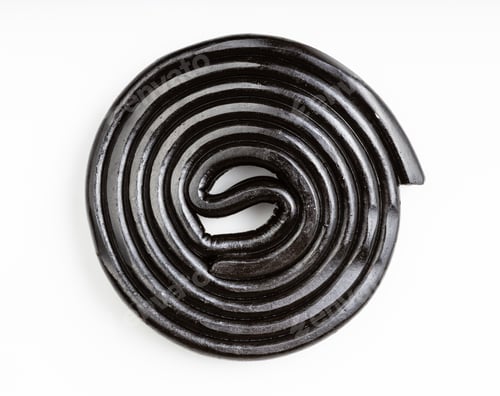 Preview: top view of spiral from liquorice candy on white