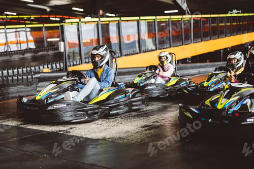 Preview: Group of Go-Kart Racers Waiting at Starting Line