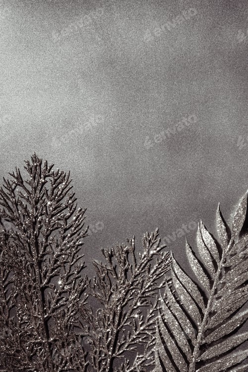 Preview: top view of shiny decorative silver twigs on grey background