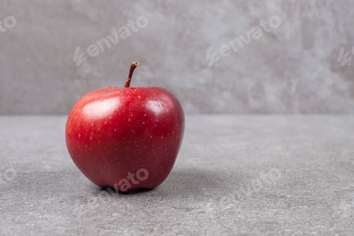 Preview: Single red apple on marble background
