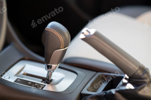 Preview: Closeup of car automatic transmission gear stick. Detail of vehicle interior