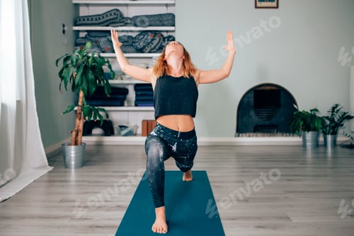 Preview: young yoga teacher doing positions at the yoga school