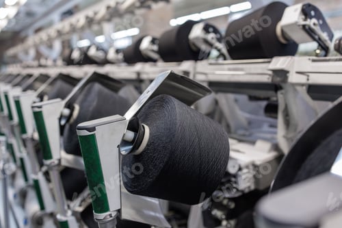 Preview: Modern Spinning Line for Yarn Production Closeup Automated Textile Industry Manufacturing Process
