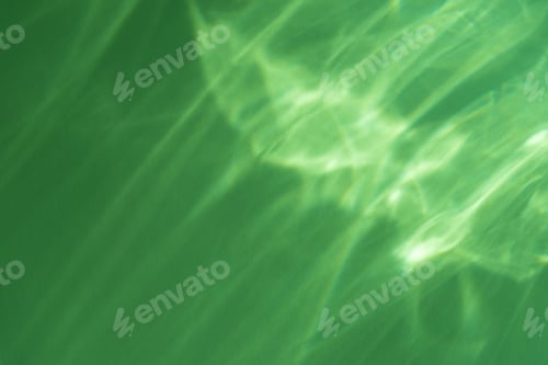 Visualização: Efeito cáustico, refração de luz na parede verde, sobreposição, maquete fotográfica, refração de raios solares desfocados