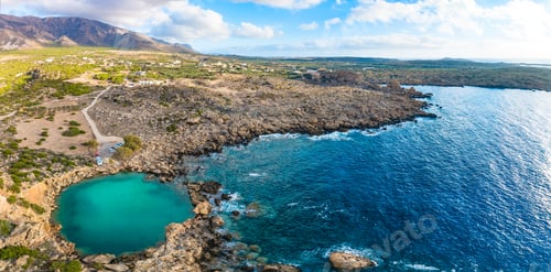 Preview: Aerial view of of a small sea crater surrounded by rocks, Voulolimni, Crete