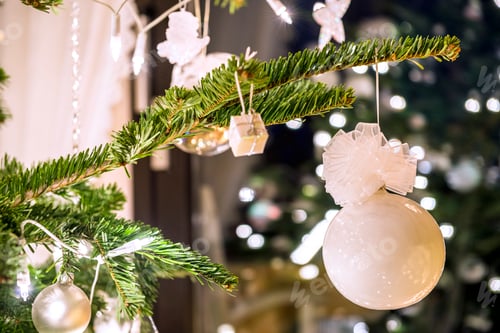 Preview: Fir branch with white Christmas decoration