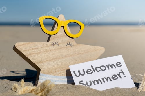 Preview: WELCOME SUMMER text on paper greeting card on background of funny starfish in glasses summer