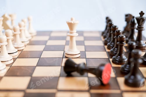 Preview: Chessboard and chess game. Competition between black and white, strategic intelligence board game.