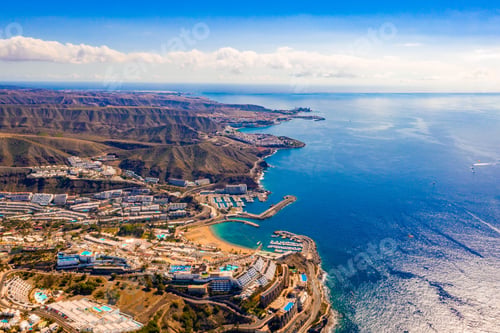 Preview: Fascinating aerial view of Gran Canaria island near Amadores beach with crystal clear water and bay