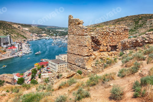 Preview: Scenic view of Balaklava bay with yachts and ruines of Genoese fortress Chembalo in Sevastopol