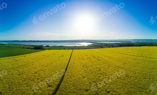 Preview: Panorama of the fields with a plant in a valley village and the sky in Bulgaria