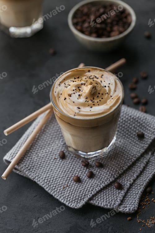 Preview: Glass of Iced Dalgona Coffee, trendy fluffy creamy whipped coffee and milk