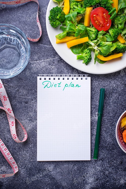 Preview: Healthy salad, clean water and measuring tape.