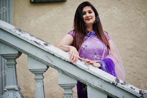 Preview: Indian hindu girl at traditional violet saree