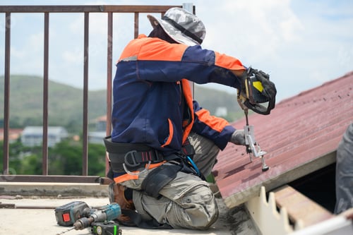Preview: Professional engineer worker installing solar panels system on rooftop