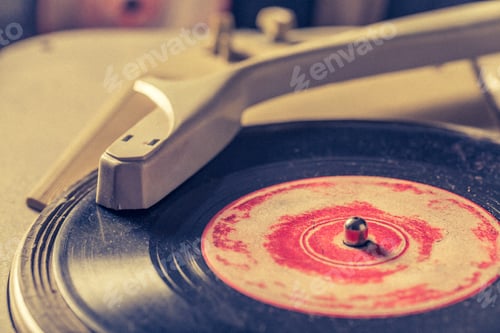 Preview: Old record player and old scratched vinyl records