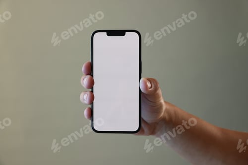 Preview: Man with modern smartphone on grey background, closeup. Mockup for design