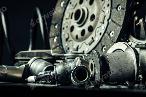 Preview: Close up of new car parts on black background