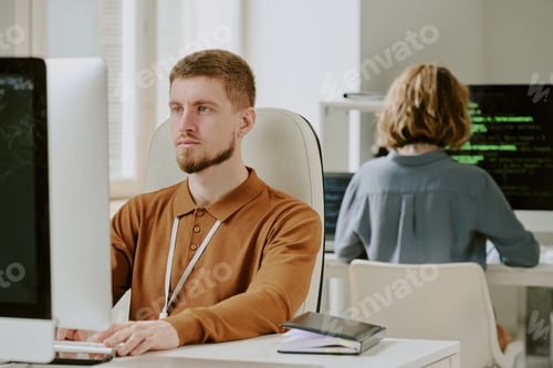 Preview: Bearded Man Working On Computer
