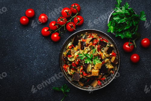 Preview: Vegetable stew, saute or caponata. Stewed eggplant with paprika, tomatoes, herbs