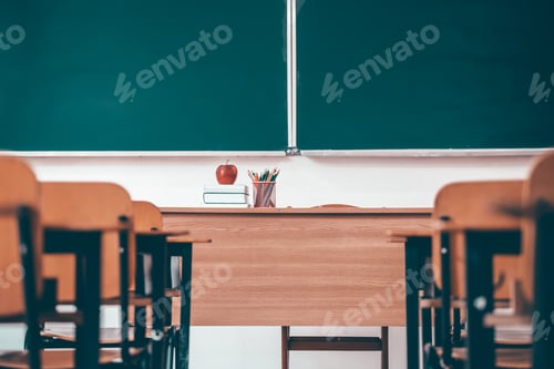 Preview: Classroom with Apple and Books on Teacher's Desk