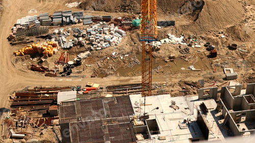 Preview: Construction of an apartment building in the summer at the stage of pouring the foundation