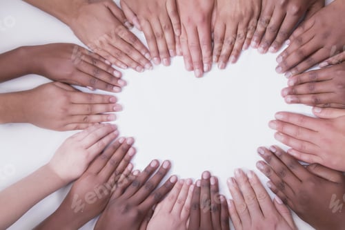 Preview: Multicultural hands on a white backdrop in a heart shape