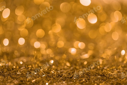 Preview: christmas texture with golden shiny blurred confetti