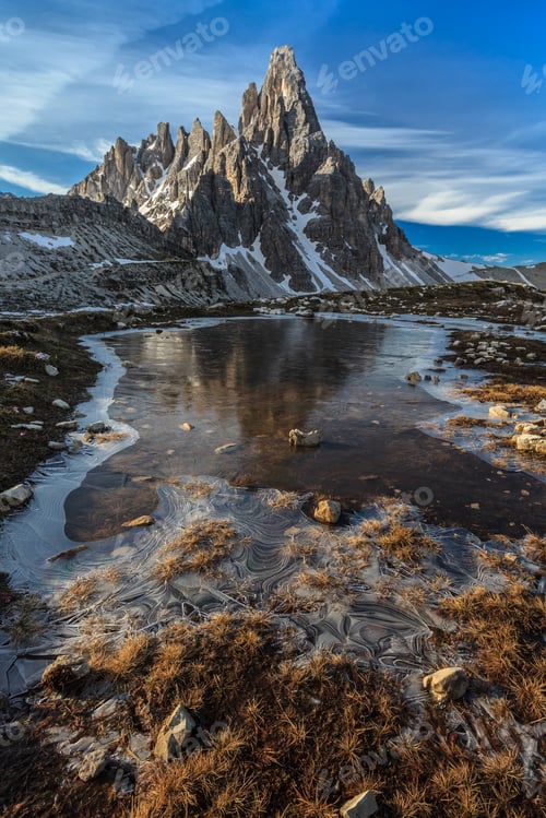 Dramatic Mountain Reflection in Icy Water, Winter Landscape
