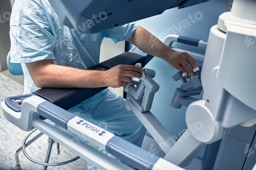 Preview: Hands of a surgeon at a computer robot. medical robot. Robotic Surgery.