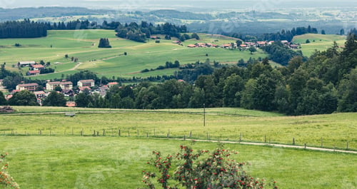 Preview: view from the mountain to the village at the foot and the ski lift