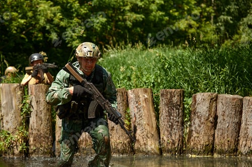 Preview: Soldiers game on military training ground battle camp. Action. Operation Trainer giving training to