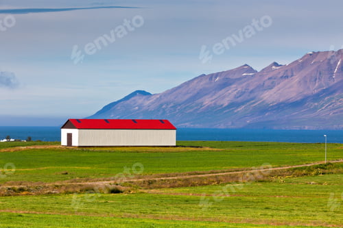Preview: White Siding Icelandic House with Red Roof