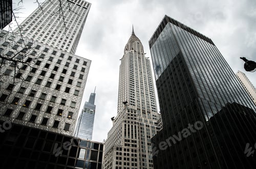 Preview: Skyscrapers and Chrysler building in downtown on cloudy day