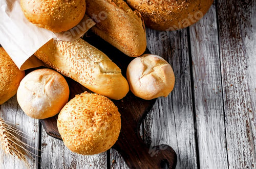 Preview: Assortment of baked goods on white old wooden table