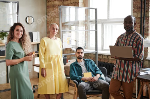 Preview: Group of designers working at office