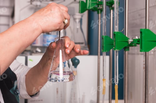 Preview: chemist works in a lab