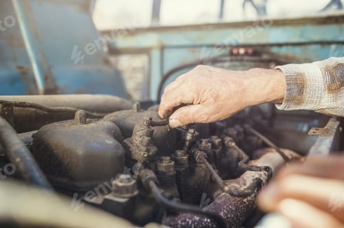 Preview: Senior farmer on a tractor