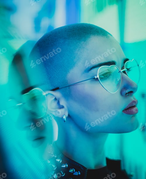 Preview: Beautiful woman illuminated by led lights