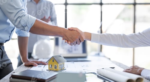 Preview: Engineer construction people shaking hands while working for teamwork in the office