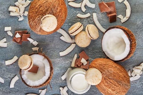 Preview: Coconut Macarons with Shredded Coconut on Grey Background, Food Blog Concept