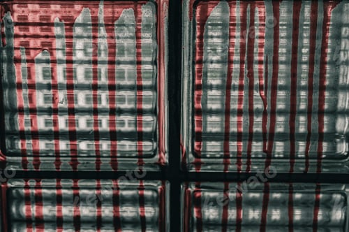 Preview: A glass wall stained with blood, Halloween murder concept.